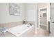 Bathroom features a large soaking tub at 1090 Indigo Ridge Pl, Cary, NC 27519