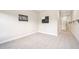 Bedroom featuring plush carpet, neutral walls, and a fun painting at 1090 Indigo Ridge Pl, Cary, NC 27519