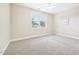 Bright bedroom with carpet floors, neutral walls, a ceiling fan, and a double window at 1090 Indigo Ridge Pl, Cary, NC 27519
