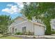 Charming home featuring a two-car garage, stone accents and landscaped yard at 1090 Indigo Ridge Pl, Cary, NC 27519