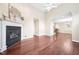 Spacious living room with fireplace, hardwood floors, and open layout at 1090 Indigo Ridge Pl, Cary, NC 27519
