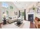 Cozy living room with vaulted ceilings, fireplace, and plenty of natural light at 1090 Indigo Ridge Pl, Cary, NC 27519