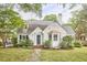 Charming exterior view featuring a well-maintained yard and classic architecture with a chimney at 1104 Englewood Ave, Durham, NC 27701