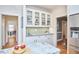 Kitchen features updated cabinets, countertops, backsplash, and stainless steel appliances at 1104 Englewood Ave, Durham, NC 27701