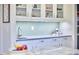 Updated kitchen features modern cabinets, countertops, and tile backsplash at 1104 Englewood Ave, Durham, NC 27701