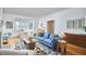 Cozy living room featuring hardwood floors, natural lighting, and stylish furnishings at 1104 Englewood Ave, Durham, NC 27701