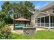 Landscaped backyard with a barbecue, gazebo, and inviting in-ground pool at 1201 Dagmar Ln, Wake Forest, NC 27587