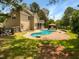 Spacious backyard featuring a lovely pool, gazebo, and well-maintained lawn at 1201 Dagmar Ln, Wake Forest, NC 27587