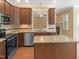 Stylish kitchen with granite countertops, stainless appliances, and a central island at 1201 Dagmar Ln, Wake Forest, NC 27587