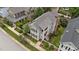 Overhead view of a well-manicured yard, lovely garden, and cozy porch of the two-story home at 124 Kingsport Rd, Holly Springs, NC 27540