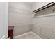 Spacious walk-in closet with ample shelving and hanging space for optimal organization at 124 Kingsport Rd, Holly Springs, NC 27540