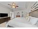 Spacious main bedroom features a walk-in closet and a view of the ensuite at 124 Kingsport Rd, Holly Springs, NC 27540