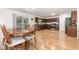 Bright, open kitchen with wood cabinets and a stainless steel refrigerator at 128 Palmdale Ct, Holly Springs, NC 27540