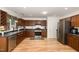 Lovely kitchen with wood cabinets, stainless appliances, and an undermount sink at 128 Palmdale Ct, Holly Springs, NC 27540