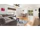 Open-concept space combining living and dining areas, featuring hardwood floors at 128 Palmdale Ct, Holly Springs, NC 27540