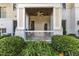 Cozy back porch with ceiling fan provides private outdoor seating at 1310 Durlain Dv # 103, Raleigh, NC 27614