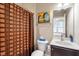 The attached bathroom features a shower and single sink vanity with a linen closet at 150 Saint Mellion St, Raleigh, NC 27603