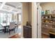 View of the dining room with a large table and chairs, view into the butler's pantry and pantry at 150 Saint Mellion St, Raleigh, NC 27603