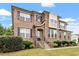 Elegant brick home with stone accents, manicured landscaping, and a welcoming front porch at 150 Saint Mellion St, Raleigh, NC 27603