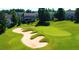 Beautiful golf course view, showcasing pristine green and a large sand bunker in the foreground at 150 Saint Mellion St, Raleigh, NC 27603