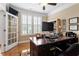 Spacious office features a large window, hardwood floors, and built-in shelving at 150 Saint Mellion St, Raleigh, NC 27603