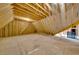 Unfinished attic space with exposed wooden beams provides opportunity for customization and expansion at 153 W Beech Slope Ct, Chapel Hill, NC 27517