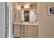 Bathroom featuring double sinks, a mirror, and modern fixtures at 153 W Beech Slope Ct, Chapel Hill, NC 27517