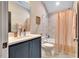 Updated bathroom with shower, vanity, and modern fixtures and paint at 153 W Beech Slope Ct, Chapel Hill, NC 27517