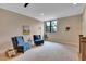 Comfortable living room with plush seating and bright natural light from the window at 153 W Beech Slope Ct, Chapel Hill, NC 27517