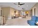 Spacious living room with neutral colors, ceiling fans, and lots of natural light at 153 W Beech Slope Ct, Chapel Hill, NC 27517