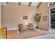 Living room showcasing two arm chairs, modern decor, and bright natural light at 153 W Beech Slope Ct, Chapel Hill, NC 27517