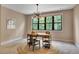 Bright office space with a modern desk, natural light, and stylish decor at 153 W Beech Slope Ct, Chapel Hill, NC 27517
