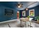 Dining room showcasing a blue ceiling, industrial lighting, and a modern table setting by the windows at 1606 Sycamore St, Durham, NC 27707
