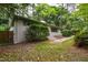 Charming home featuring lush landscaping and a welcoming front yard at 1606 Sycamore St, Durham, NC 27707