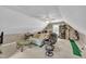 Cozy bonus room with neutral carpet, complemented by a ceiling fan, couch, and desk for comfortable living at 171 St. Jiles Dr, Clayton, NC 27520