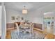 Dining room featuring a round table, elegant decor, and a harmonious blend of colors and textures at 171 St. Jiles Dr, Clayton, NC 27520
