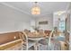Bright dining room with hardwood floors, pendant lighting, and stylish decor, perfect for entertaining at 171 St. Jiles Dr, Clayton, NC 27520