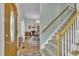 Inviting entryway showcases staircase and dining room, offering a glimpse of the home's layout and design at 171 St. Jiles Dr, Clayton, NC 27520