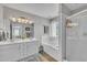 Serene main bathroom with double vanity, soaking tub, and separate shower at 171 St. Jiles Dr, Clayton, NC 27520