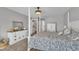 Light-filled main bedroom featuring neutral decor, carpet, and stylish white furniture at 171 St. Jiles Dr, Clayton, NC 27520