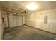 This two car garage has an automatic door opener and unfinished walls at 1848 Glenn St, Burlington, NC 27217