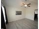 Open-concept living room features vaulted ceilings, wood-look floors, and natural light at 1848 Glenn St, Burlington, NC 27217