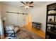 Inviting bedroom with neutral tones, area rug, ceiling fan, and comfortable seating at 1916 Hart St, Durham, NC 27703