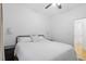Serene bedroom featuring natural light, ceiling fan, and minimalist aesthetic at 1916 Hart St, Durham, NC 27703
