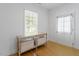 Bright entryway offers a decorative table with baskets and a window at 1916 Hart St, Durham, NC 27703
