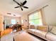 Bright living room featuring hardwood floors, neutral sofa, and natural light at 1916 Hart St, Durham, NC 27703
