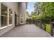 Spacious back deck with stylish railings, perfect for outdoor entertaining and relaxation at 202 Stoneleigh Dr, Cary, NC 27511