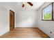Bedroom featuring hardwood floors, bright windows and neutral walls at 218 Forestville Rd, Wake Forest, NC 27587