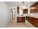 Cozy kitchen with classic wooden cabinets and ample counter space at 218 Forestville Rd, Wake Forest, NC 27587