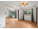 Living room with multiple windows offering natural light and beautiful hardwood floors at 218 Forestville Rd, Wake Forest, NC 27587